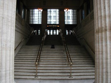 Tardsie Poses For A Photo On The Steps At Union Station.